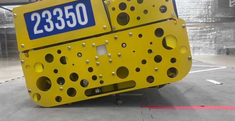 Close-up of Cypher's tilt mechanism on its yellow side plate