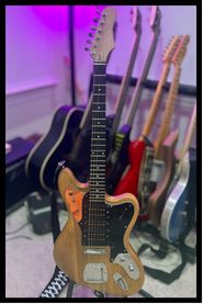 Alpha, the natural finish guitar